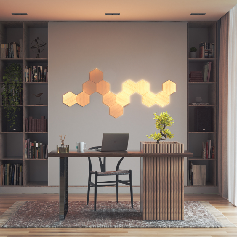 Nanoleaf Elements Thread-enabled wood-look hexagon smart modular light panels mounted to a wall in a home office. HomeKit, Google Assistant, Amazon Alexa, IFTTT.