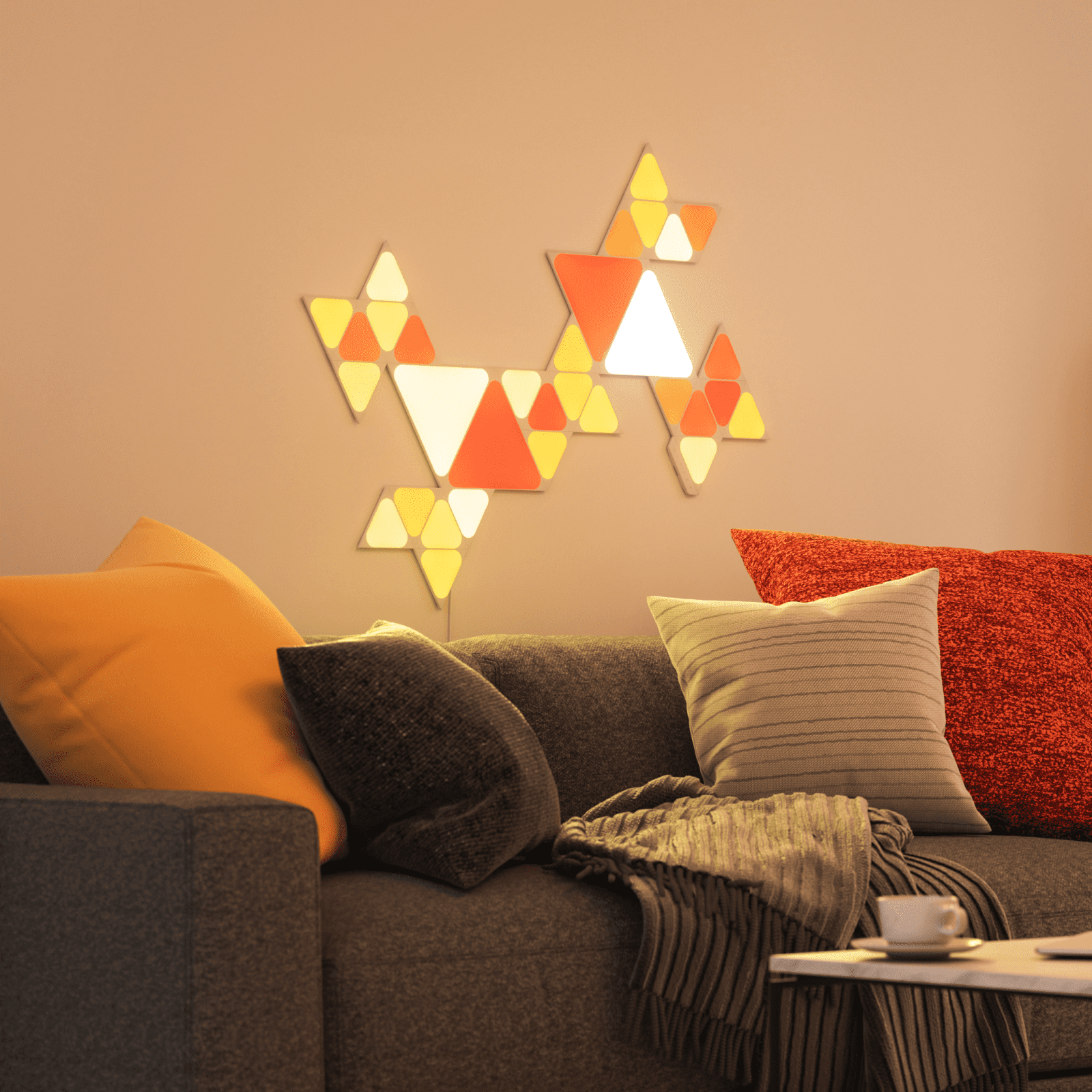 Nanoleaf Shapes Thread enabled color changing triangle and mini triangle smart modular light panels.